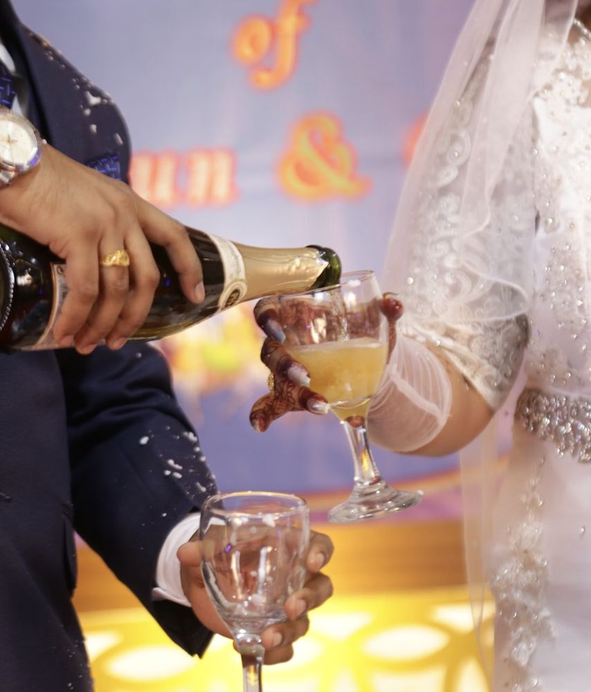 Celebratory applause and confetti photographed at an elegant event